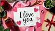 © Babb - Pink hearts surround a handwritten love note
