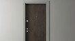 © Jafree - Closed modern interior door with wood texture on gray wall. Entrance door for residential house apartment or office. Minimalist home design with metal handle and peephole. Architectural house element