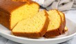 © Rendy Dastian - Classic pound cake dense buttery texture sliced on plate