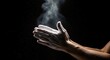 © MopoWe - Weightlifter hands with white magnesium carbonate chalk dust exploding in a dark gym studio with sharp focus and dramatic rim lighting for fitness