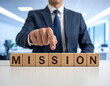 © magele-picture - Mission - Geschäftsmann zeigt auf den Text 'Mission'