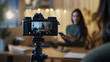 © Natalia Klenova - Woman recording educational video with camera on tripod