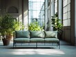 © Herman - Modern sofa with green cushions in a spacious, sunlit industrial-style room