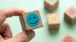 © Gambar - happy smiley face on wooden block