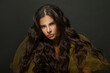 © millaf (Nemchinova) - Beautiful woman hair. Beautiful model with long curly hairstyle posing