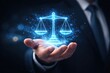 © Alamin - Man holding scales of justice on dark background, law and legal services concept and fairness.