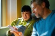© Artcore Studio/Stocksy - Friends share a moment while looking at a phone