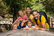 © Manu Padilla/Stocksy - Family with young children enjoying outdoor adventure