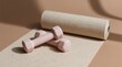 © oksa_studio - Wellness and fitness lifestyle dumbbells and yoga mat for exercise healthy living home workout weight training