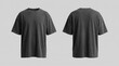 © holycityprinting - Front and back view of a blank charcoal black oversized t-shirt mockup with a vintage washed texture, isolated on a light grey background.