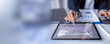 © groviapoto - Hand and graph on tablet laptop screen at desk accounting, finance report and profit growth. Accountant, digital and budget for financial stats,
