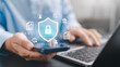 © Anon - Cyber security, personal data privacy protection, secure online banking, and encrypted digital transaction safety Concept. Businessman using smartphone and laptop with shield and padlock icons.