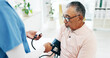 © peopleimages.com - Senior, man and nurse with blood pressure machine in hospital with arm pump for exam. Elderly, male person or caregiver monitoring health on screening for hypertension, medical checkup or assessment