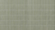© MonTeArt - A seamless wall of vertical sage green tiles with white grout lines arranged in a modern stack bond pattern for interior design.