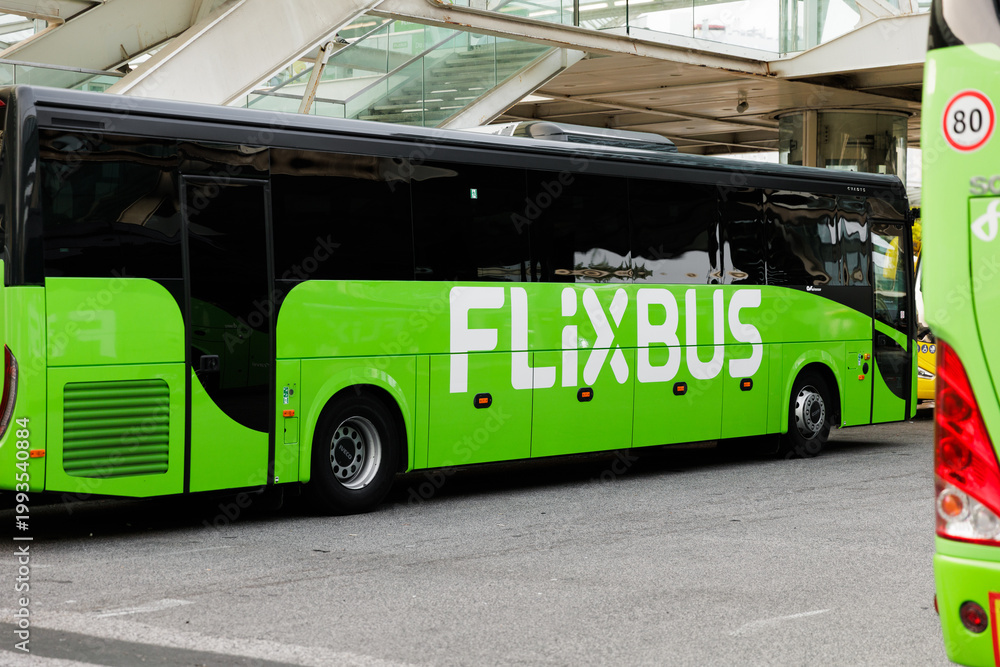 Lisbon, Portugal – 20 April, 2026. Side view of a green Flixbus ...