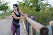 © FotoAndalucia - Woman Stretching and Warming Up Before Running