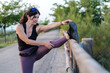 © FotoAndalucia - Woman Stretching and Warming Up Before Running