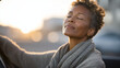 © forenna - Middle-aged Black woman exhaling slowly in parked car outside bank, eyes closed, hands gripping steering wheel, golden hour light flooding windshield, financial anxiety relief, emotional recovery, h
