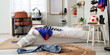 © Pixel-Shot - Interior of messy teenager's room with bed, workplace and shelf units