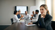 © SenpaiNoticeMe - close up of disengaged employee during meeting with blurred team in background with copy space on left clean office setting for text silent conflict and communication breakdown concept