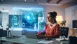 © Saim - Person in modern home office working on laptop with large holographic digital display of charts and 3D globe, symbolizing futuristic data analysis and communication.