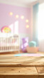 © lilyax - Wooden Table Surface in the Foreground with a Blurred Nursery Room Background Featuring a Crib and Toys