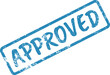 © Sohara - Grungy blue APPROVED stamp mark on a clean white paper background