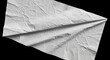 © lynkid1966 - A close-up view of a wrinkled paper texture, showcasing its crumpled surface and folds in a studio setting with a black background.