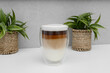 © Paweł Kacperek - Hot coffee with visible layers in a clear glass, latte macchiato