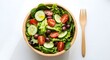 © Urban Taste Media - Salad bowl with spoon and copy space on white background healthy food advertising