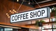 © Ameer - Coffee shop hanging sign inside modern cafe interior with warm lights