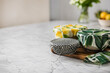 © JP.Studio - AI generated reusable food wraps on a clean kitchen counter with soft light and copy space eco friendly storage solution promoting sustainable zero waste lifestyle
