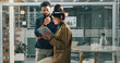 © peopleimages.com - Business, people and reading with tablet at night for research, data analysis and finance report. Team, digital and investment with statistics, financial comparison and working late for profit growth
