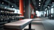 © dmmarychev - Leather weight bench in modern gym interior with blurred background