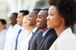 © Juan - Business professionals standing in line looking forward representing leadership vision teamwork and corporate success