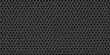 © Bipul - Dark gray perforated metal panel with a repeating hole pattern