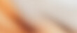 © MASUM.ME - Abstract blurred background with warm orange and beige tones, soft out of focus texture with smooth color gradients, minimalist aesthetic backdrop for modern graphic design and web banners.