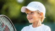 © Ruzana - Young tennis enthusiast testing grip techniques in active sports setting