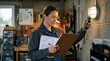 © Justlight - Electrician measuring light output from garage lamps clipboard with upgrade notes prominent garage walls and equipment fading softly into background blur.