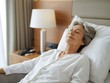 © Paull - Simple healthy living lifestyle menopause aged Asian woman take a rest relaxing with self awareness.