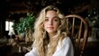 © PRIMPROW - Portrait of a Young Woman with Long Hair in a Cozy Living Space