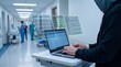© Long - Person working on computer with augmented reality virtual screens and floating data symbols