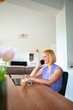 © Jelena - Working from home while enjoying a cup of coffee