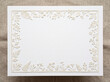 © Olga - Blank Floral Paper Cut Invitation Card With Decorative Botanical Frame On Neutral Fabric Background