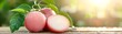 © Sumet - Fresh and Juicy Fruits on Wooden Table Surrounded by Green Leaves in Natural Light with Water Droplets