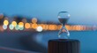 © Mirza Hakim - Time awareness concept, hourglass standing, symbol of passing time and impermanence