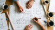 © Omishu Makes - Architects Hands Working on Building Blueprints and Architectural Drawings