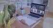 © vectorfusionart - Writing child wearing yellow top joining online class at desk, laptop and notebook, copy space