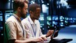 © DC Studio - System administrators running analysis on servers helping businesses manage databases, host websites and store files. Technicians auditing data center equipment used for high performance computing