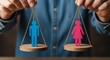 © zuperabah - Gender Equality Scales: Blue Man and Pink Woman Figures Balanced on Weighing Scales